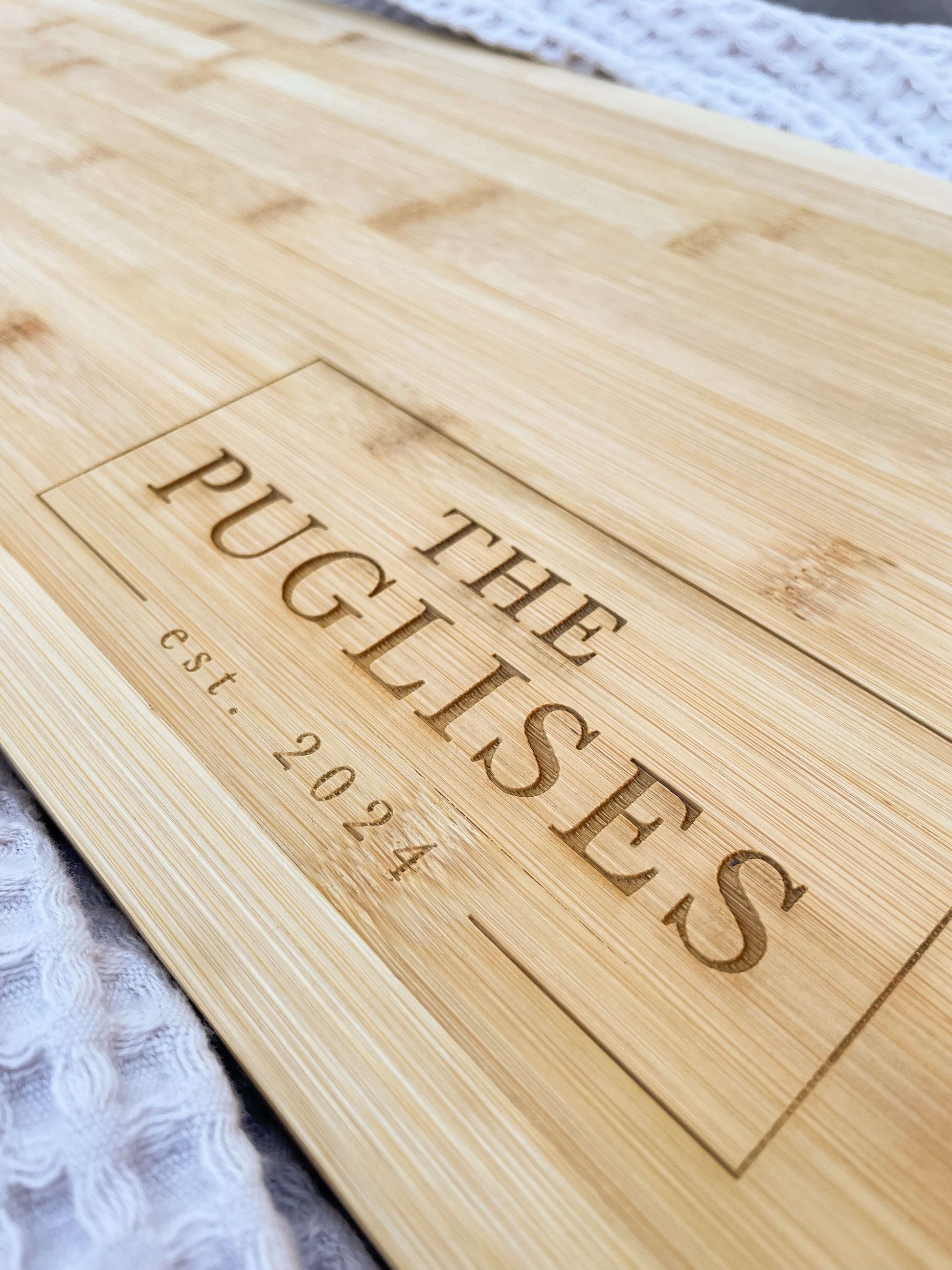 Large bamboo charcuterie board with custom family name design, gift for weddings housewarming realtors