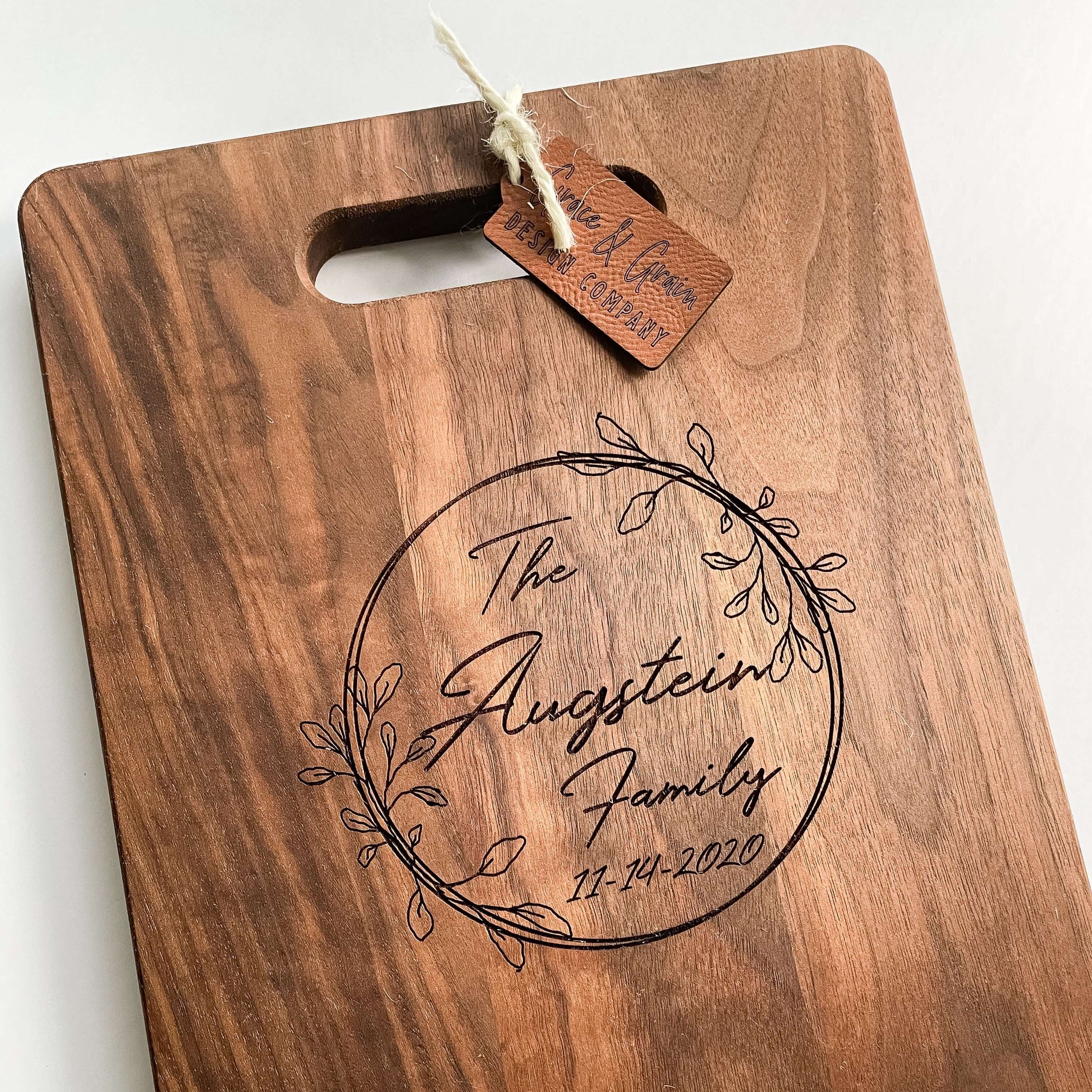 Engraved walnut wood serving board, personalized wedding housewarming realtor gift with floral family name design